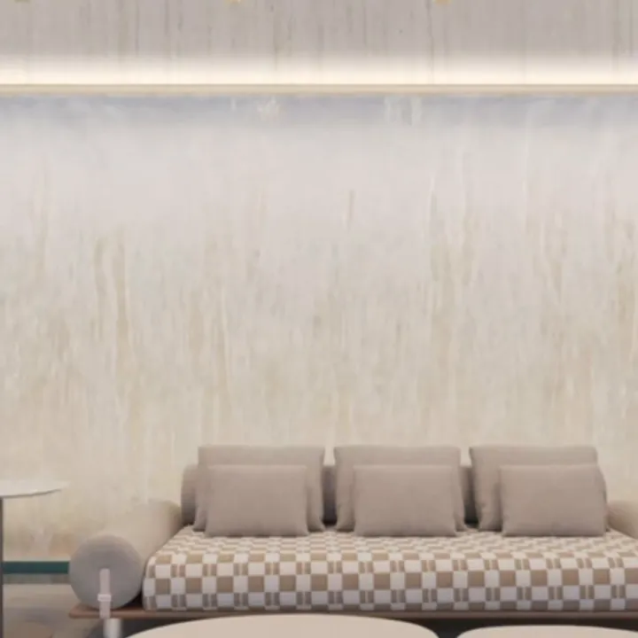 Lounge com sofás claros, frame do vídeo